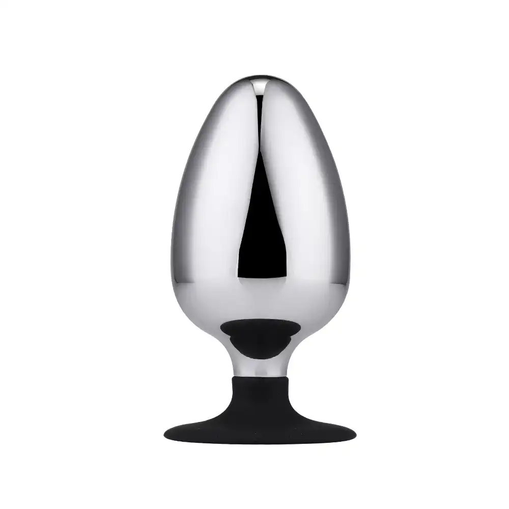 Large metal butt plug with a black suction base