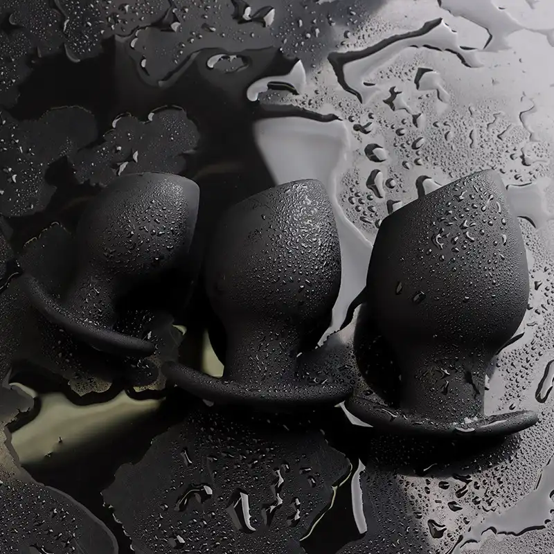 Black silicone hollow butt plugs in different sizes