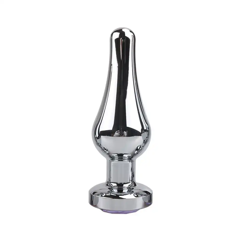 Large metal butt plug with a jewel-encrusted base