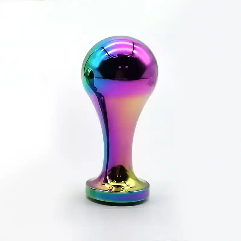 Rainbow-colored large metal butt plug for women